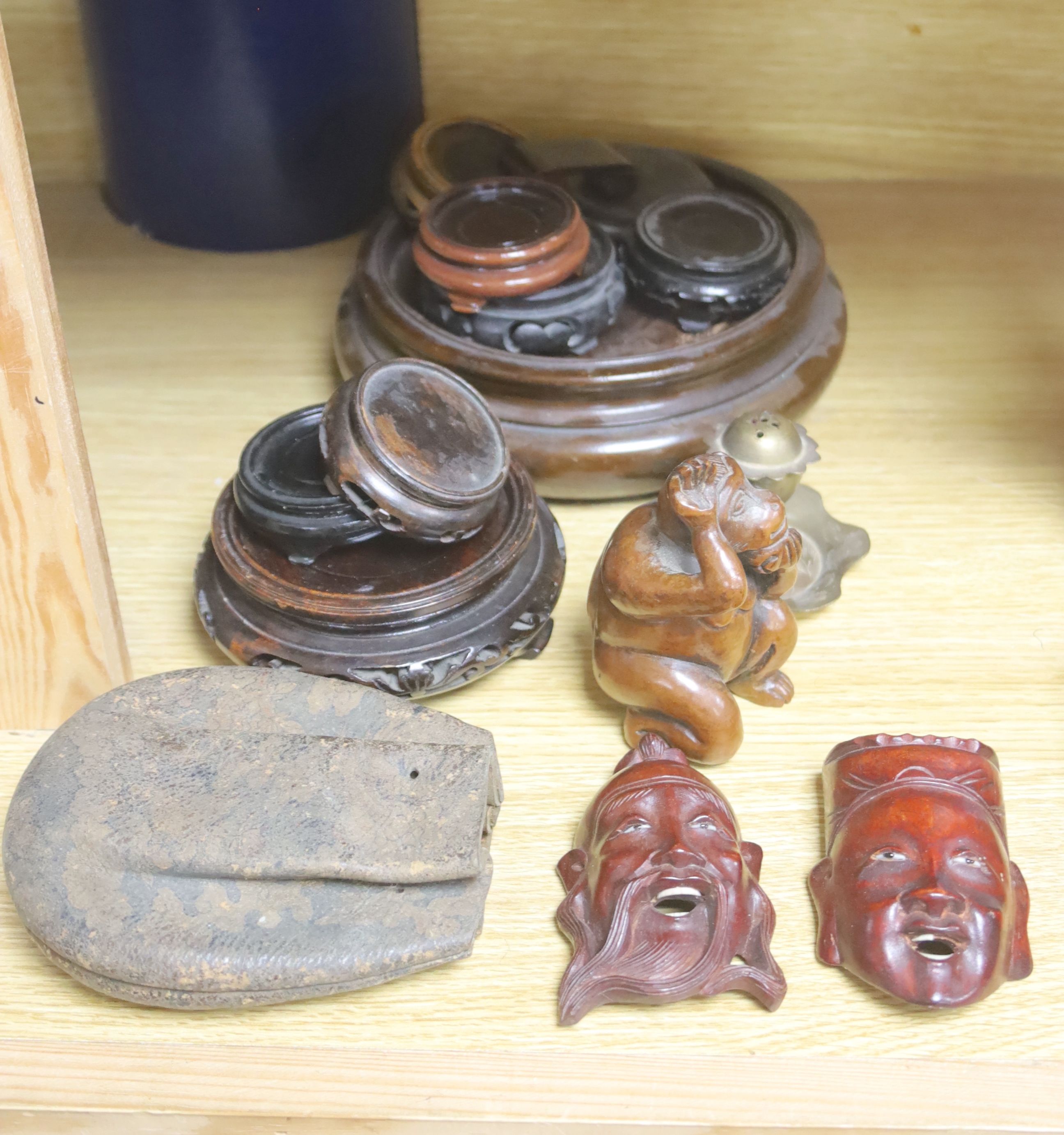 A quantity of Chinese hardwood stands and carvings